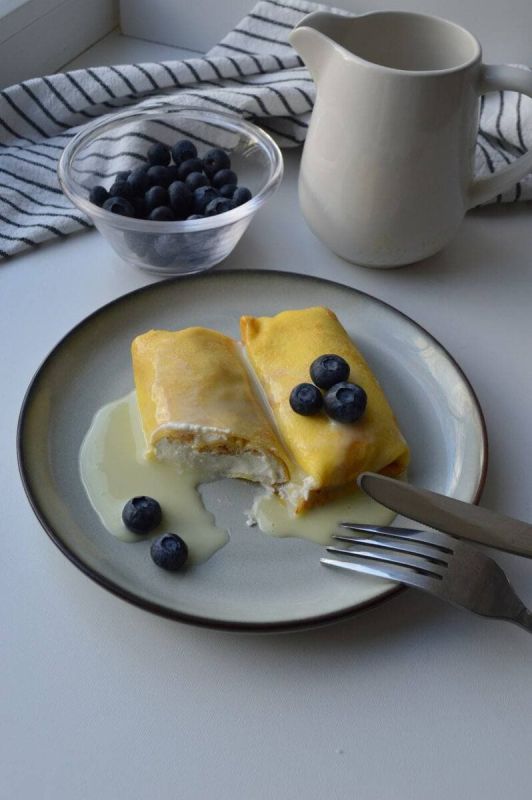Нежные блины с творожной начинкой: как порадовать себя на праздники